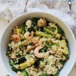 A white bowl of shrimp risotto