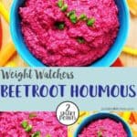 A blue bowl full of pink beetroot hummus / houmous