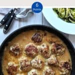 Swedish Meatballs in a skillet with a dish of courgette zoodles