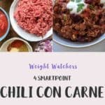 A white bowl filled with chili con carne & rice topped with yogurt and green herbs