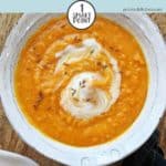 A bowl of carrot & lentil soup