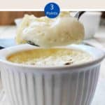 Egg Custard being spooned out of a ramekin