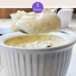 Egg Custard being spooned out of a ramekin