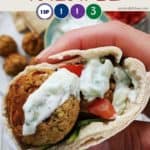 Falafel in a pitta bread with salad and sauce