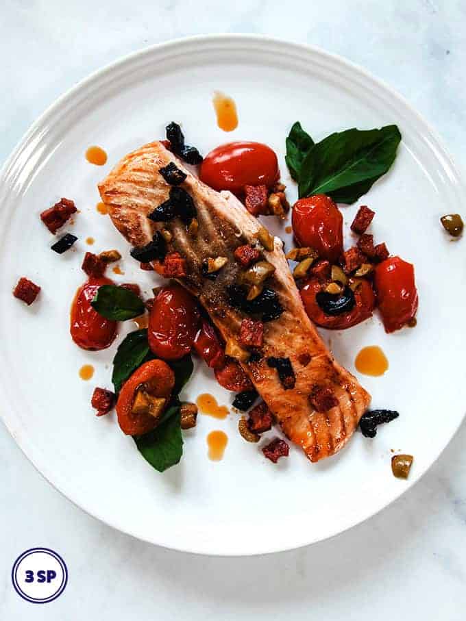 Chorizo salmon on a white plate