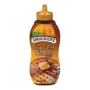 A bottle of Smuckers sugar free breakfast syrup