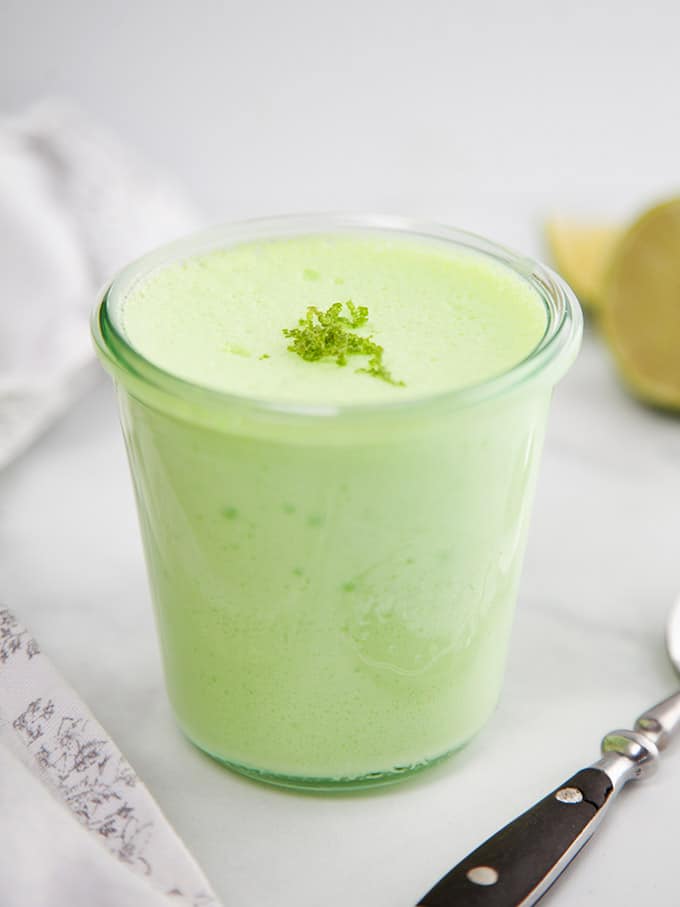 A pot of Weight Watchers lime fluff on a white table.