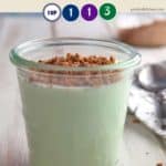 A glass of green pistachio pudding