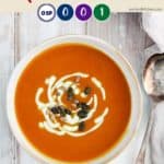 A bowl of soup on a white table