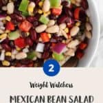 A white bowl of Mexican bean salad