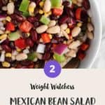 A white bowl of Mexican bean salad