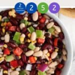 A white bowl of Mexican bean salad