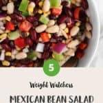 A white bowl of Mexican bean salad