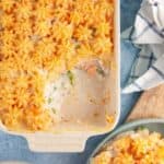 A dish of fish pie on a blue table