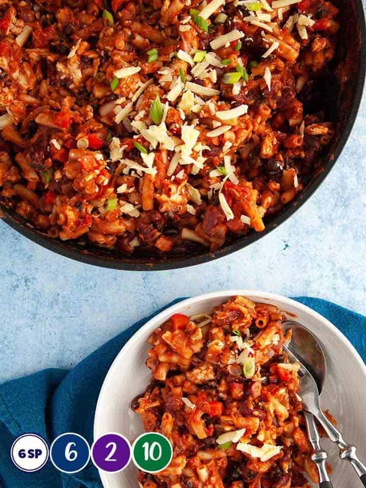 A frying pan full of turkey chili mac & cheese