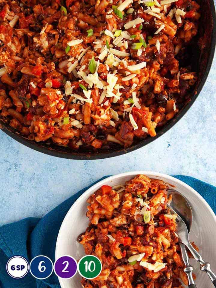 A frying pan full of turkey chili mac & cheese