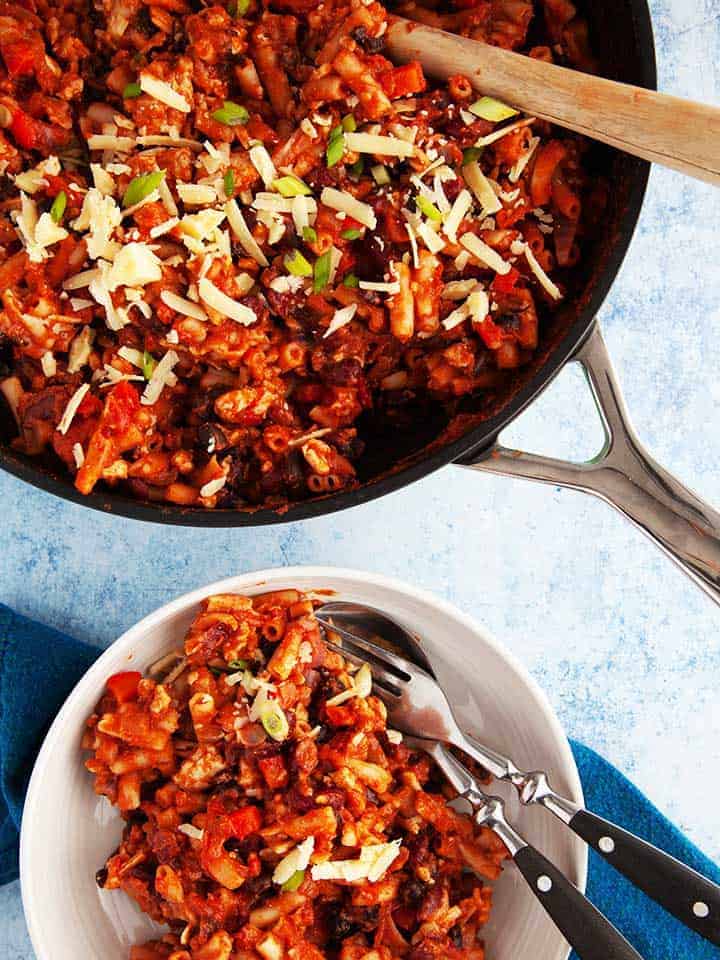 A skillet of turkey chili mac & cheese