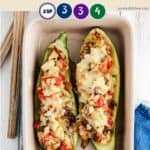 A cream dish full of stuffed zucchini