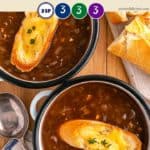 Two bowls of soup with croutons and french bread