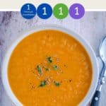 A white bowl of WW Carrot & Ginger Soup