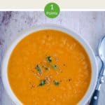 A white bowl of WW Carrot & Ginger Soup