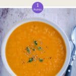 A white bowl of WW Carrot & Ginger Soup