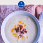 A bowl of soup on a wooden table