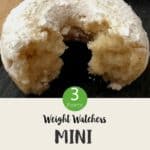 A half eaten donut with text overlay stating Weight Watchers Mini Donuts.