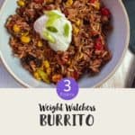 A bowl of burrito mixture topped with yogurt and chopped spring onion on a white table & text overlay 'Weight Watchers Burrito Bowl'.