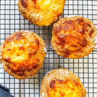WW cheese biscuits on a wire rack.