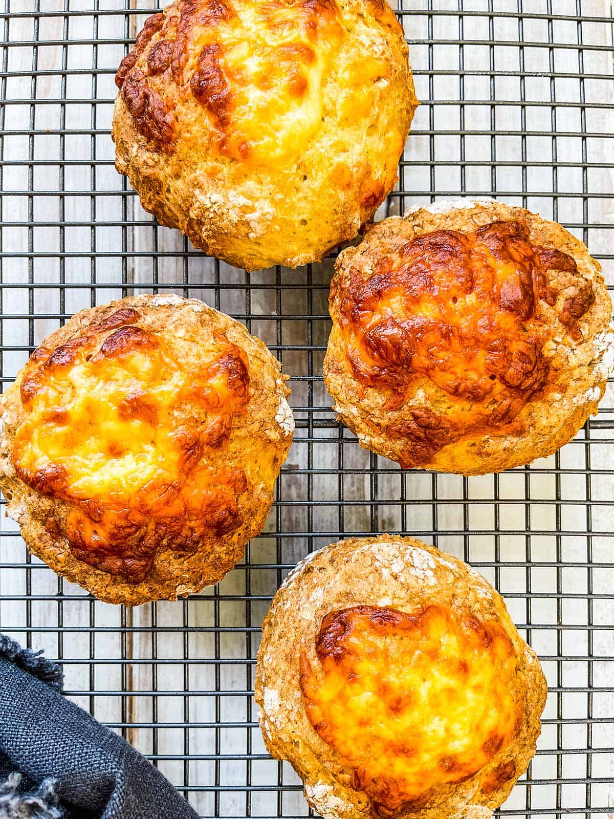 WW cheese biscuits on a wire rack.