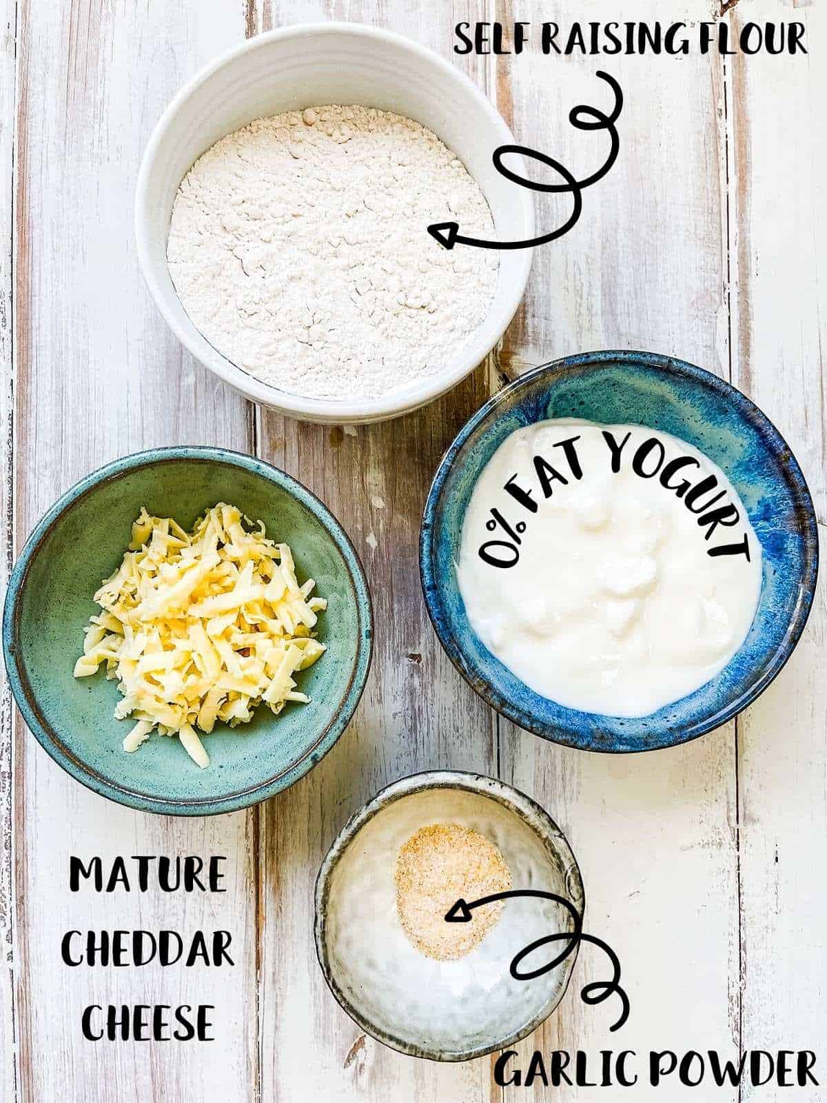 4 dishes of the ingredients needed to make the cheese scones with labels.